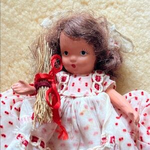 Charming Porcelain Doll in Red Polka Dot Dress